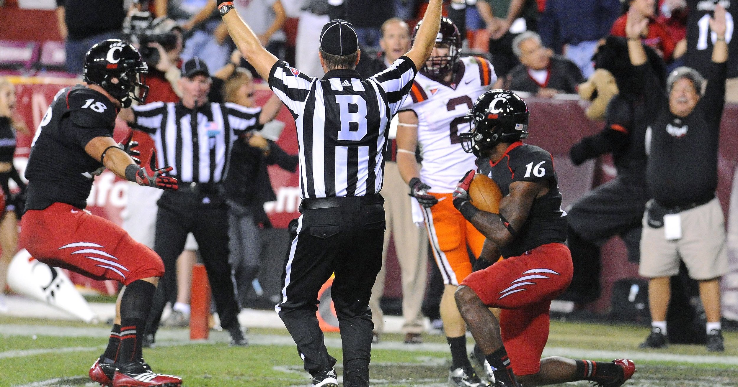  Travis Kelce (left) and Damon Julian celebrate the game-winning touchdown. [Photo: Richard Lipski / AP]  